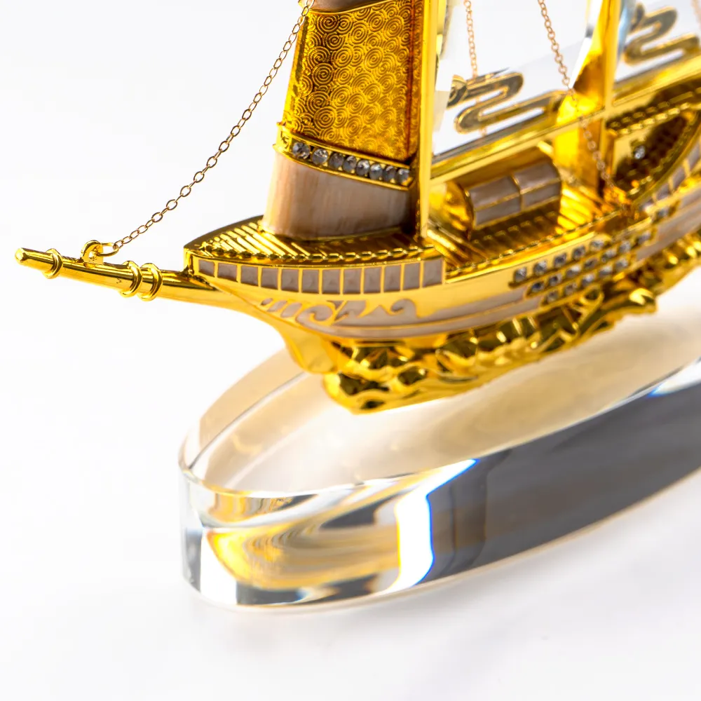 Golden Boat Shaped Memento in Metal with Glass Base in Luxury Box 5