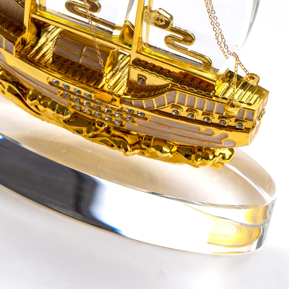 Golden Boat Shaped Memento in Metal with Glass Base in Luxury Box 1